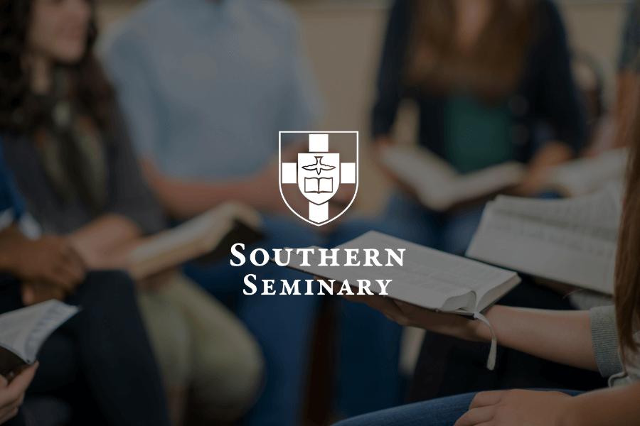 Group of people with bibles blurred out with a white Southern Seminary logo with shield above the words with a bird, bible and cross in it